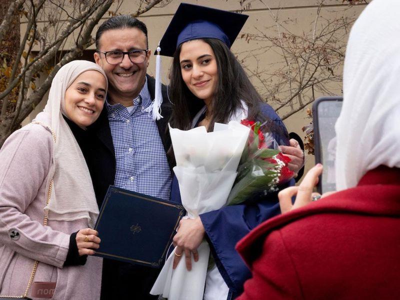 Family celebrating a new graduate